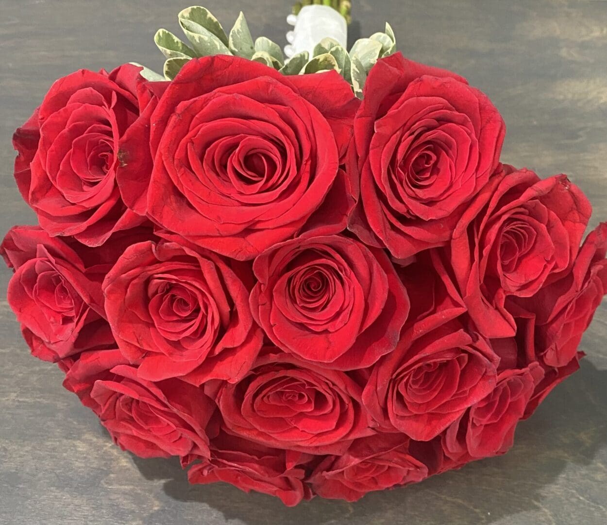 A bundle of large red roses
