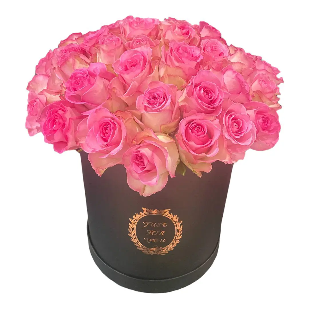 A gift box with bright pink roses