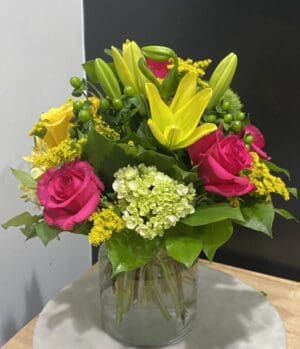 Yellow and pink flowers in a vase