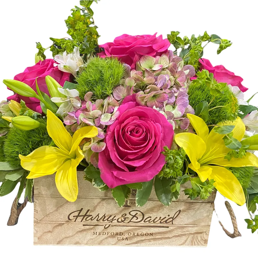 A box of pink and yellow flowers