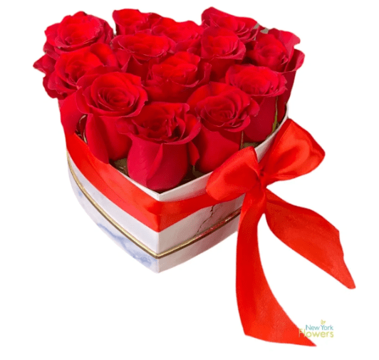 A heart-shaped gift box with red roses