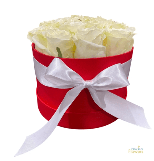 A red gift box with white roses