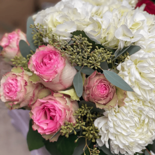 A bundle of pink and white flowers