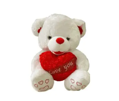 A white bear plushie with a red heart