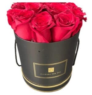 A black gift box with red roses