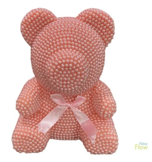 A bear made of pink beads