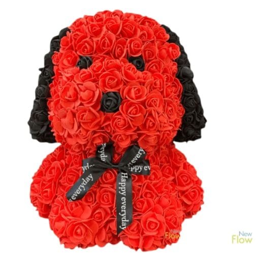 A puppy made of red and black roses