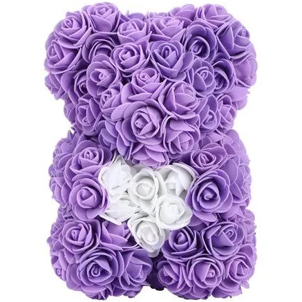 A purple rose bear with a white heart