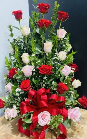 A bundle of red and white roses
