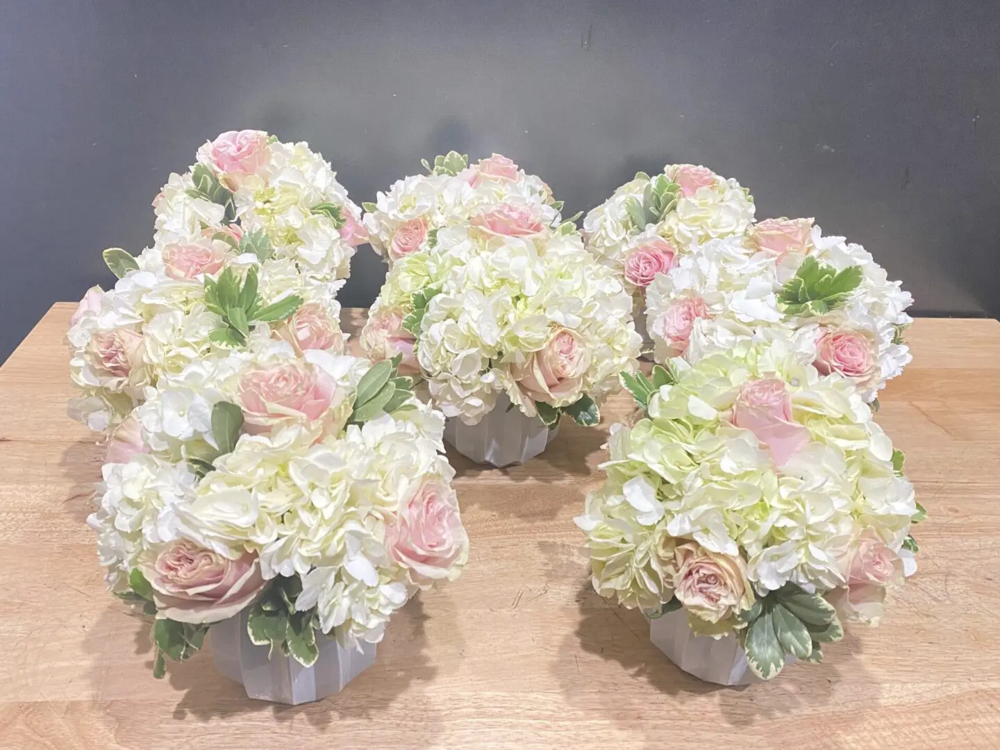 Bouquets of white and pink roses
