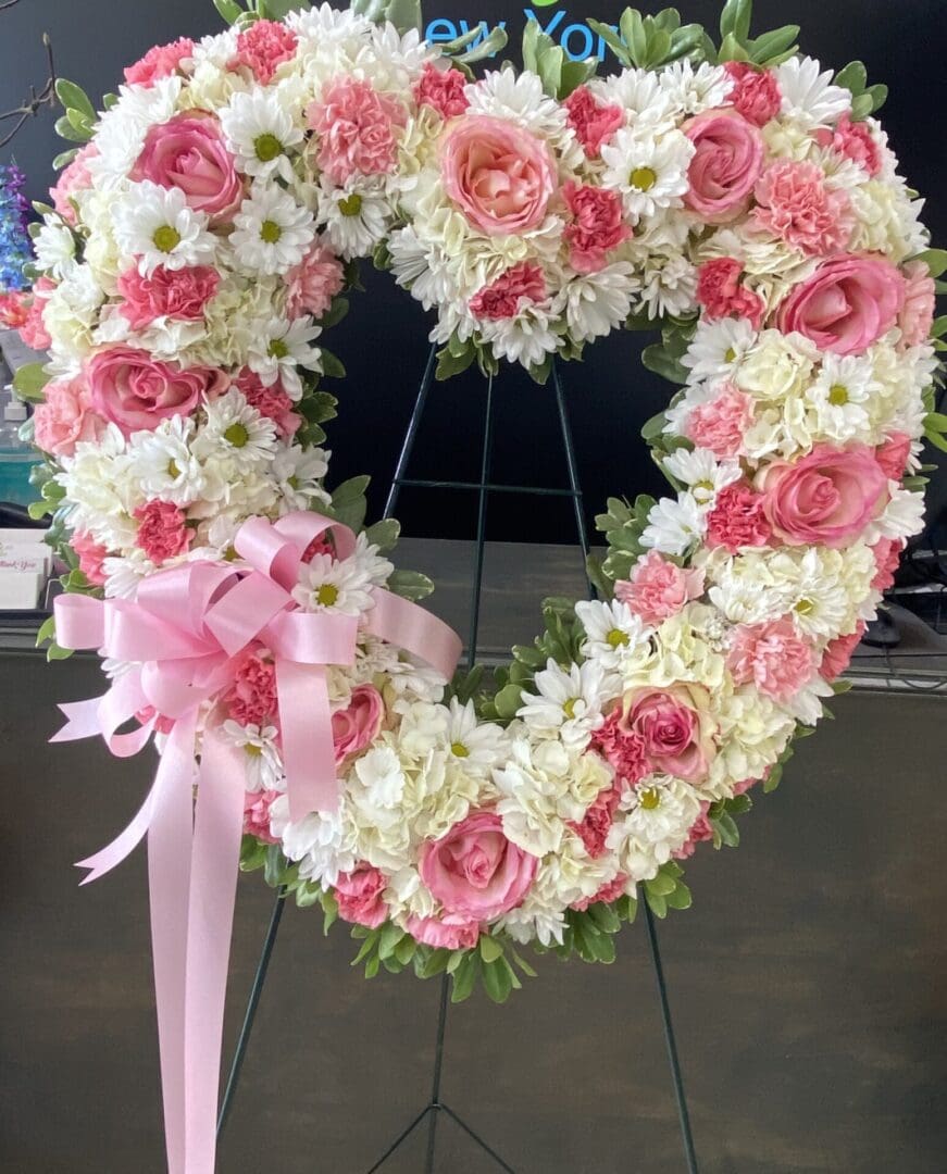 A pink and white floral wreath