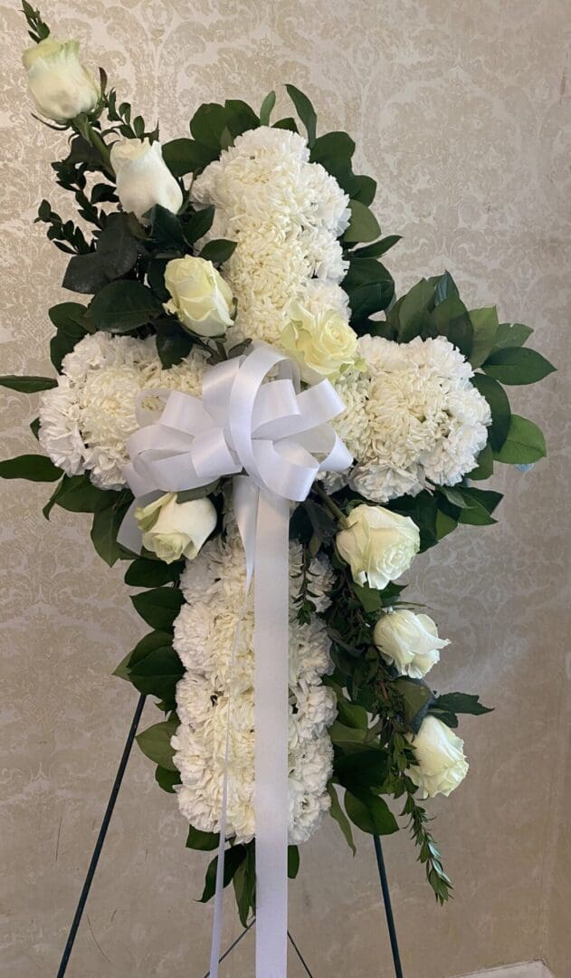 A cross made of white roses