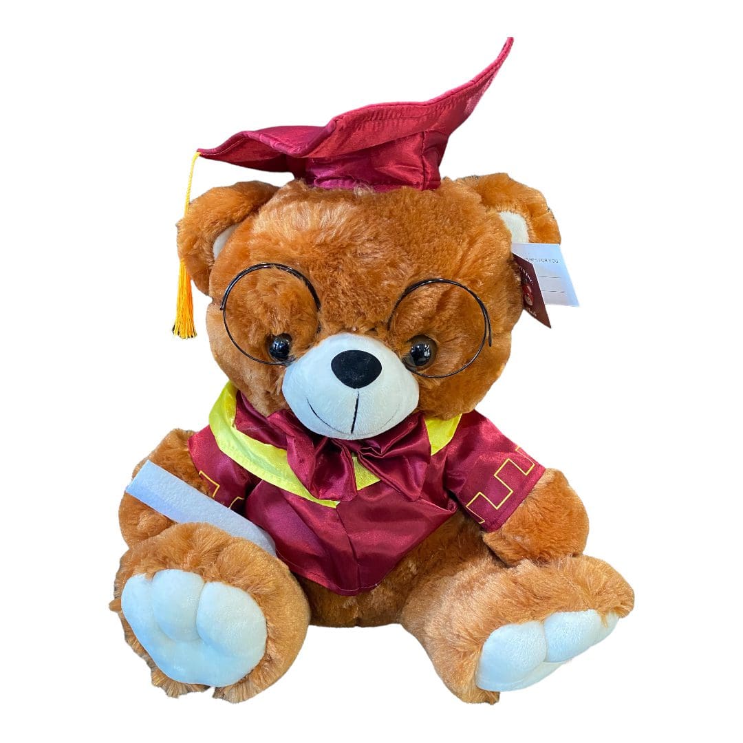 A bear wearing a maroon graduation outfit
