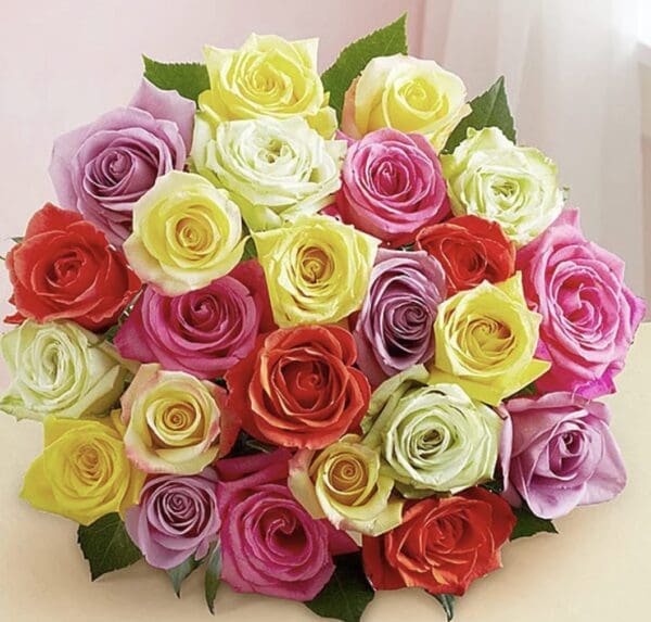 A bouquet of yellow and pink roses