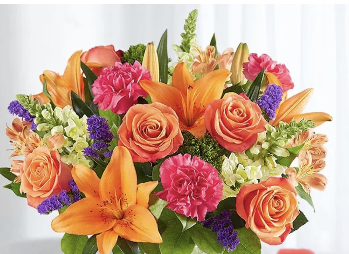 A bundle of orange and pink flowers