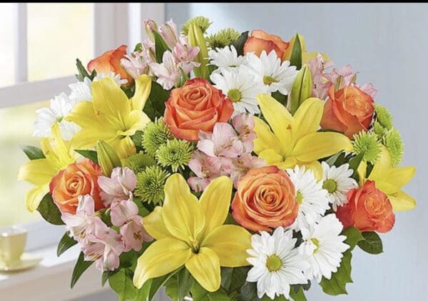 A bouquet of orange and yellow flowers