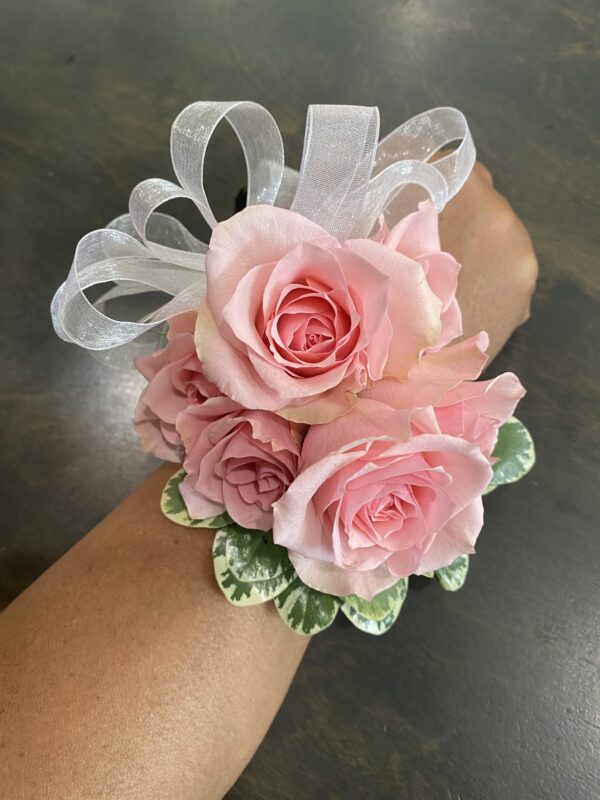 A bracelet with pink roses
