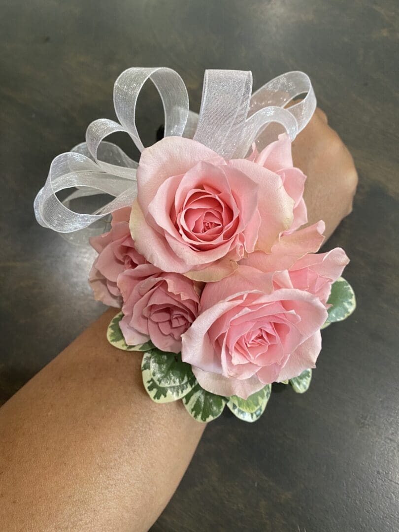 A bracelet with pink roses