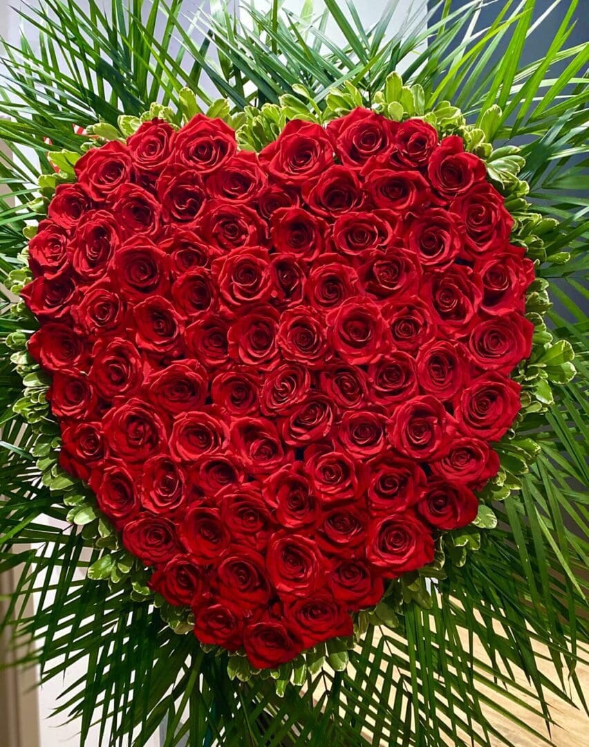 A rose bouquet shaped like a heart