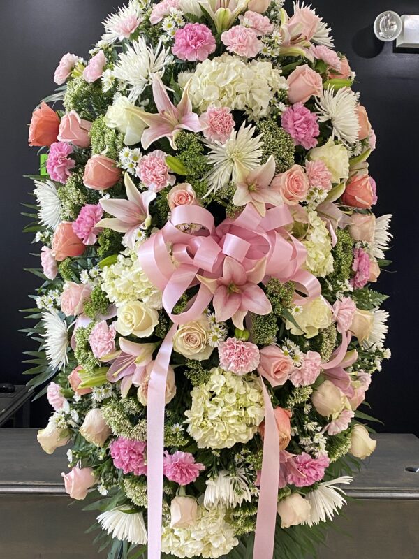 A large bundle of white and pink flowers