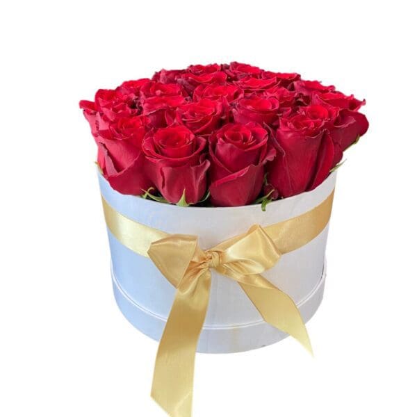 A white box full of red roses