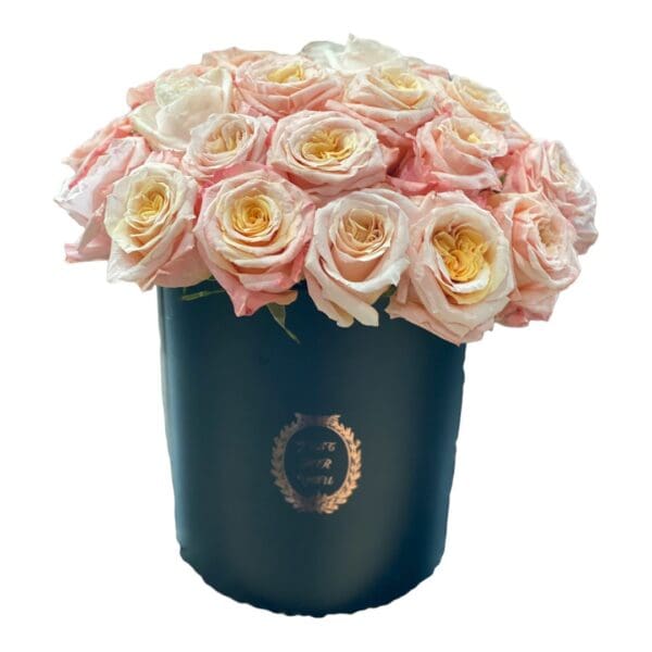 A black gift box with pink roses