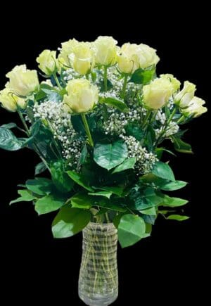 White roses bouquet on a black background