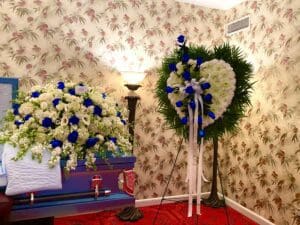 Set Blue Sky Sympathy Flowers in a room
