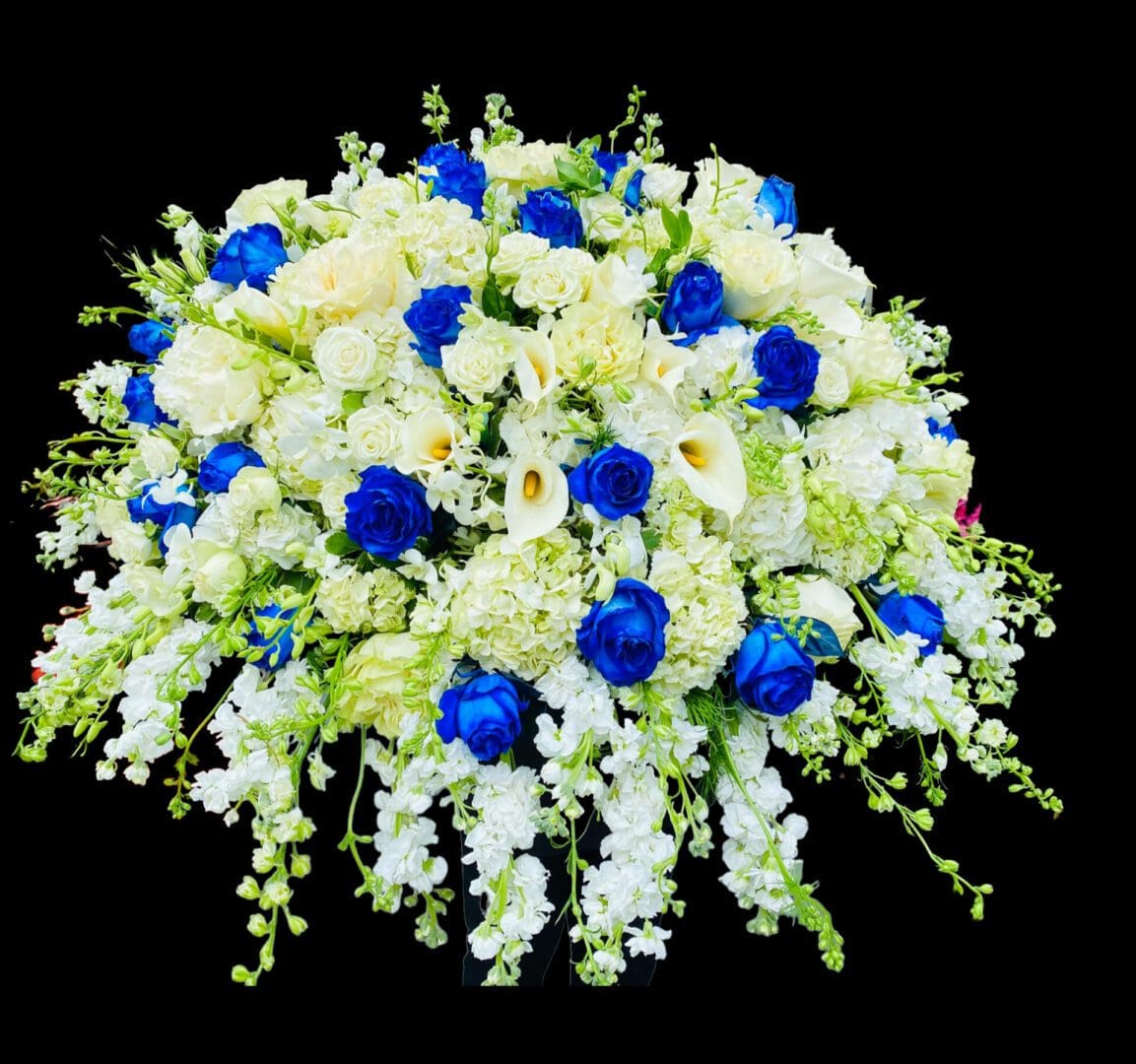 Blue and White Casket Spray by New York Flowers