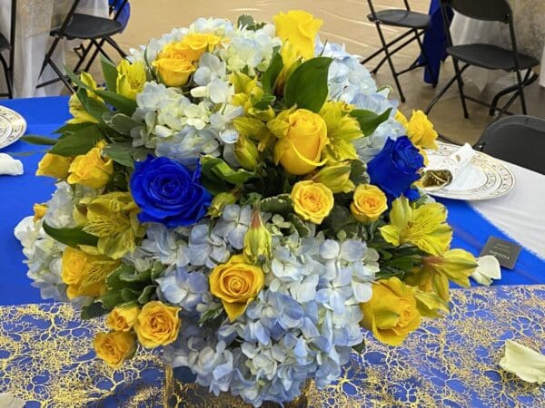 Centerpieces Yellow, White and Blue Flowers