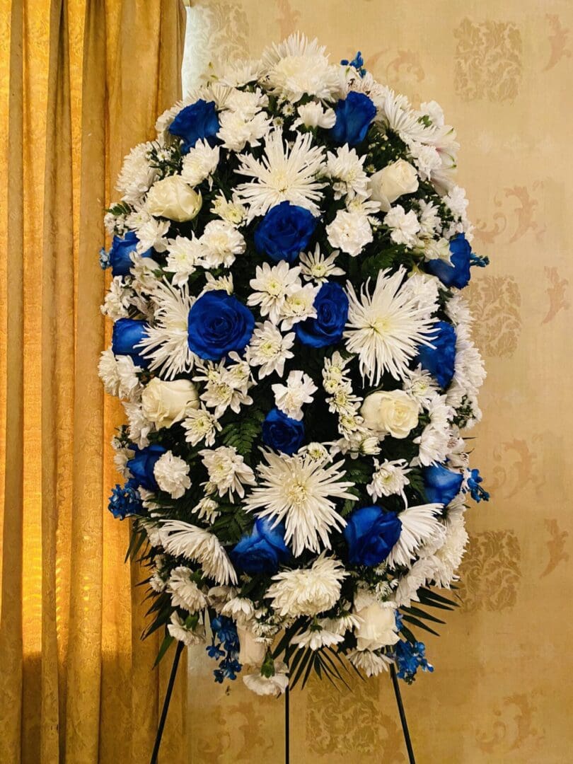 Blue and White Funeral Standing Spray