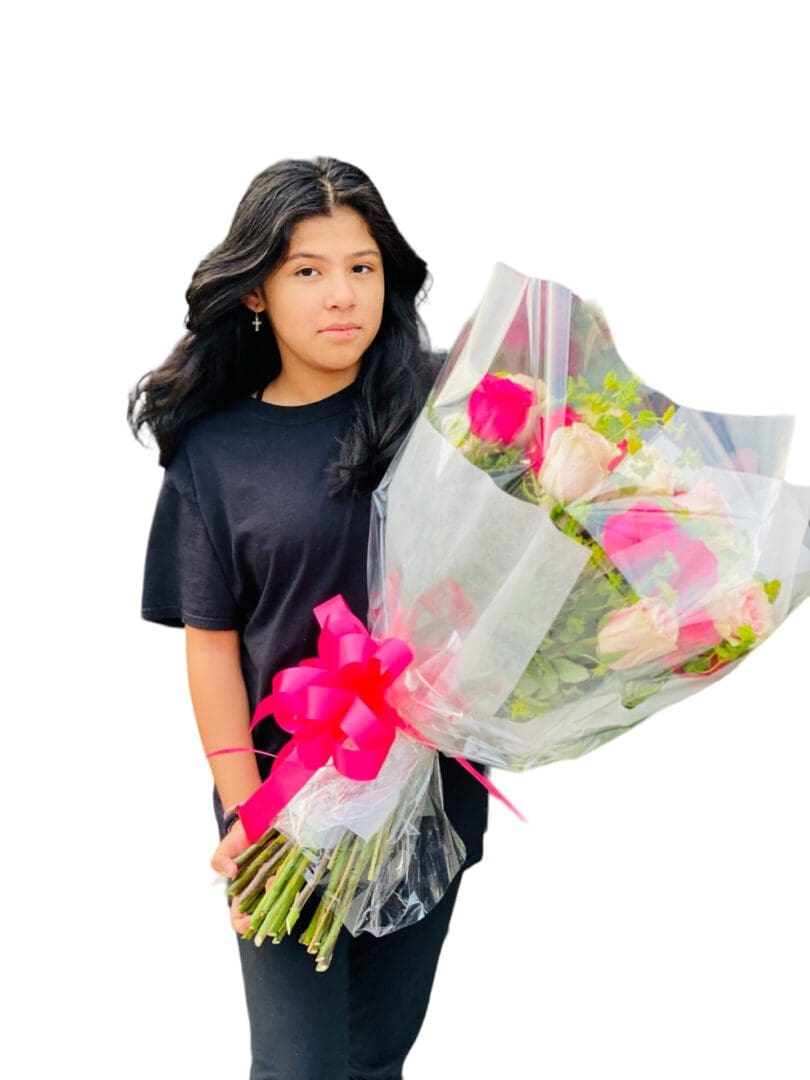 Woman Holding 24 Mix Pink Long Stem Roses Bouquet