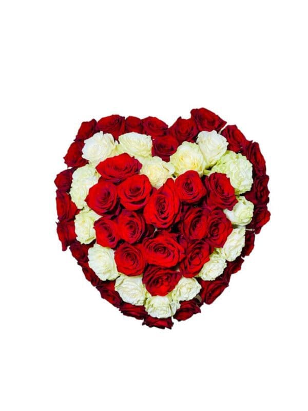 White roses with red roses border in a heart shaped box