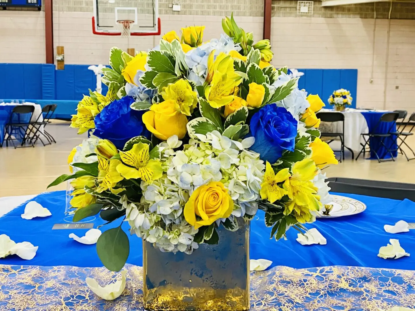 Bright Centerpiece Yellow and Blue Flowers