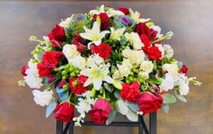 Graceful Red and White Casket Spray