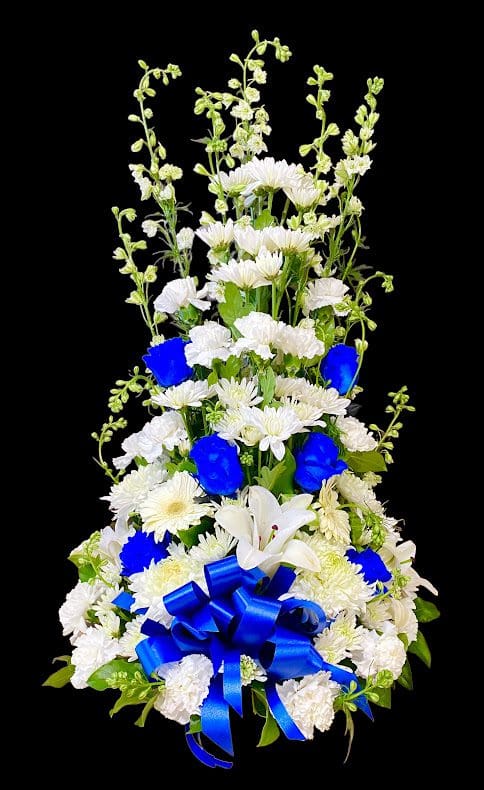 Blue and white floral basket on a black background