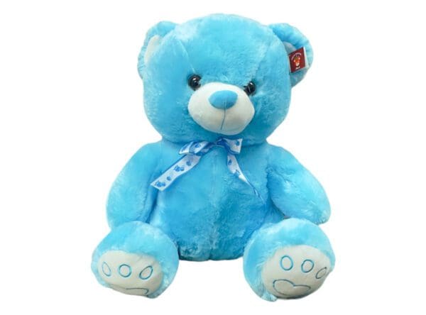 A blue plush teddy bear with a ribbon around its neck on a white background.