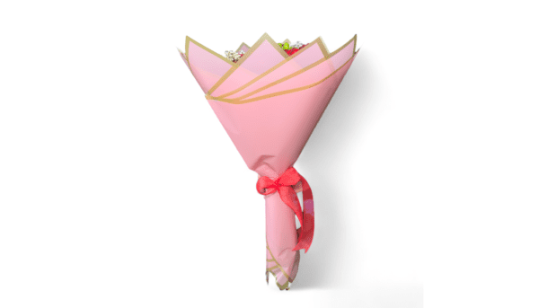 Pink bouquet wrapped with gold ribbon.