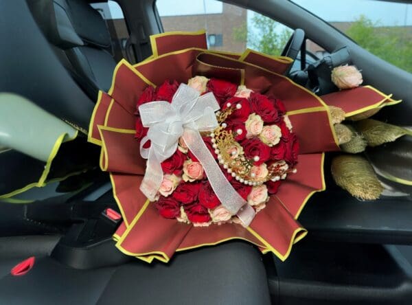 Red and pink roses in a bouquet.