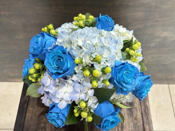 BLUE FLOWERS BOUQUET WRAPPED